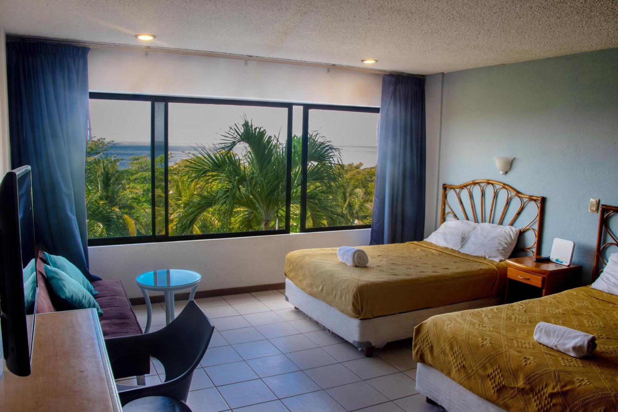 Beachfront Apartments Канкун Номер фото