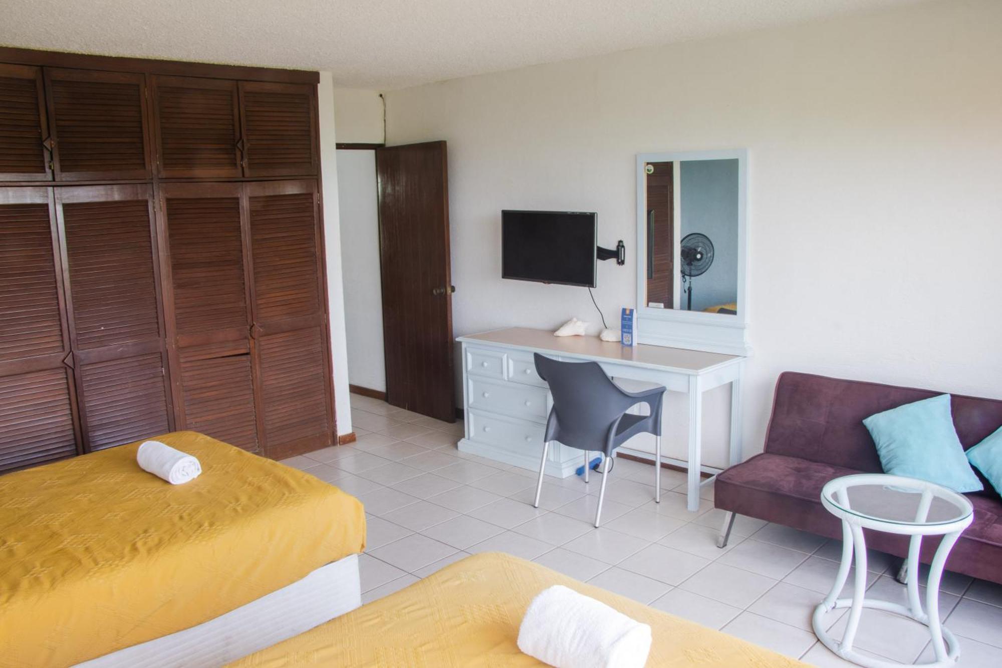 Beachfront Apartments Канкун Номер фото