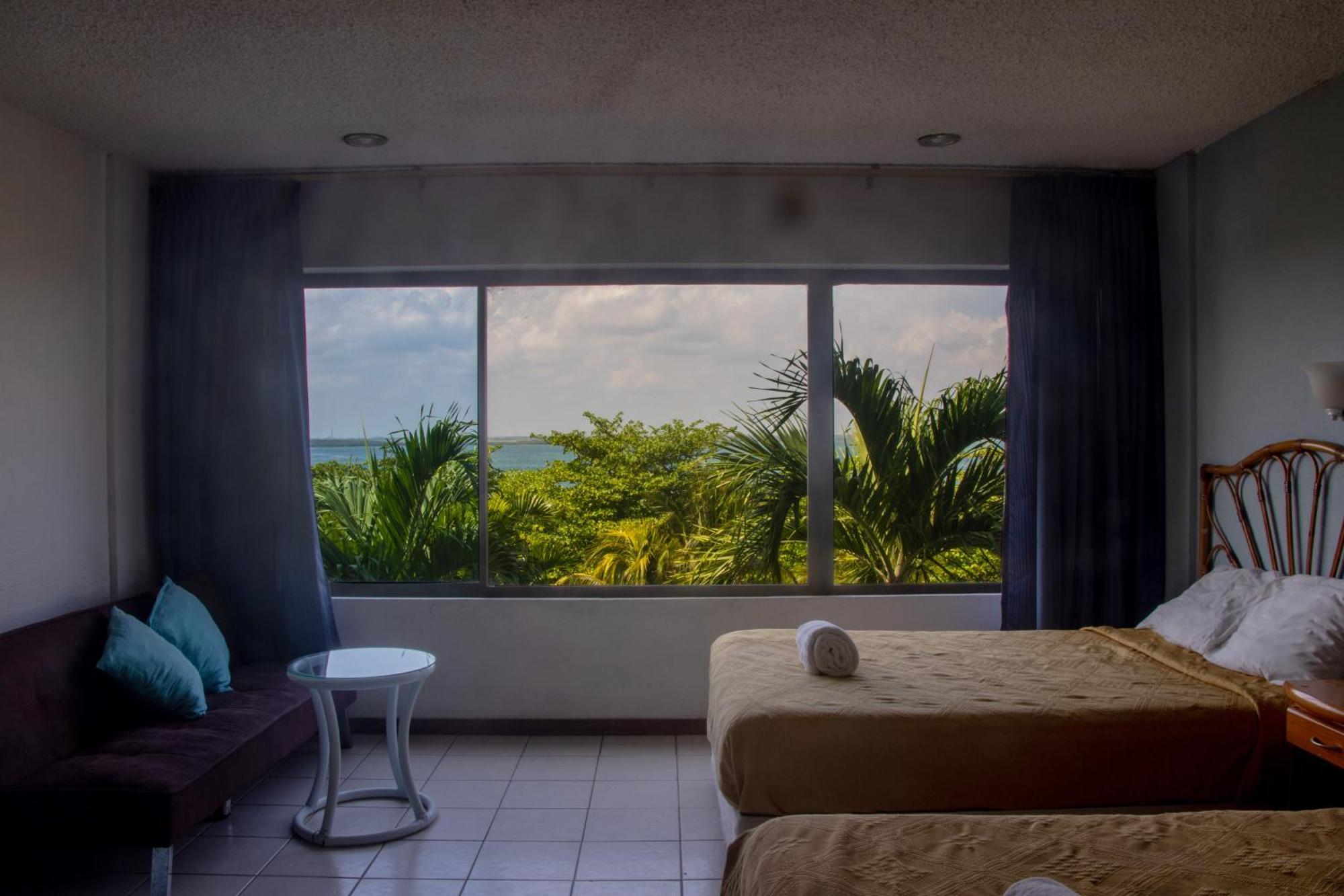 Beachfront Apartments Канкун Номер фото